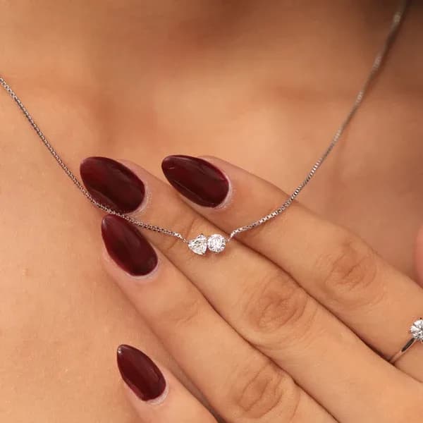 Heart and round diamond earrings