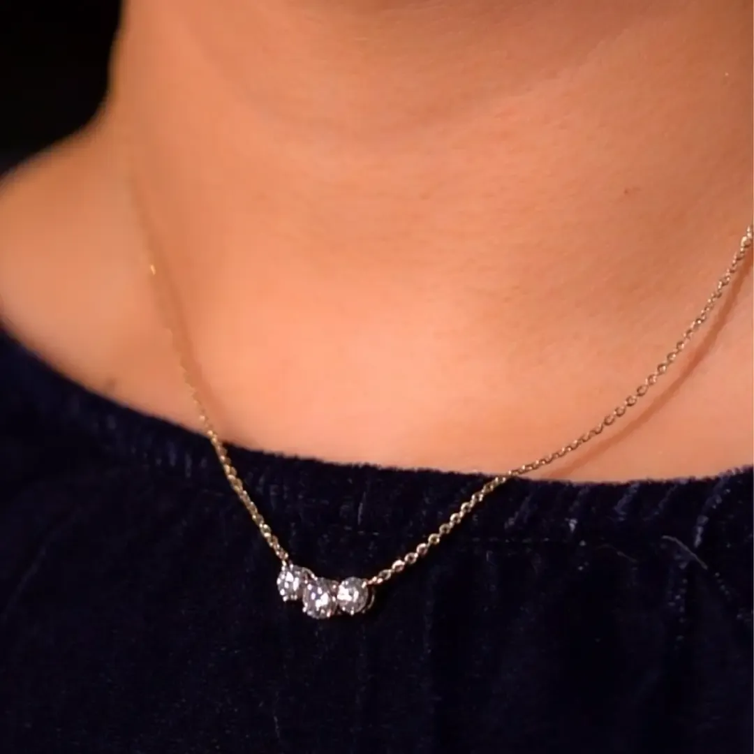 Triple solitaire diamond necklace